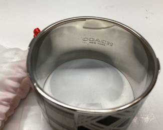  COACH CHUNKY CUFF DESIGNER BRACELET WONDERFUL SILVER TONE WITH MINIMALIST ABSTRACT PATTERN DESIGN. COMES WITH COACH BAG FOR STORAGE.