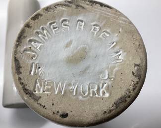 8 VINTAGE WINE, SPIRTS AND VINEGAR STONEWARE BOTTLES SOME ARE FROM GERMANY FROM THE LATE 70â€™s AND 4 ARE JAMES R BEAM STONEWARE POTTERY