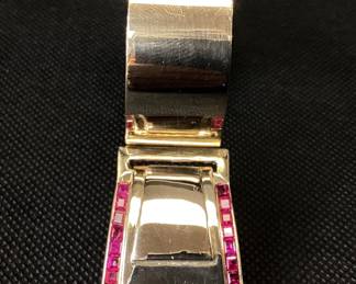 1950â€™s Gutenstein Brothers 14k Buckle Bangle With Over 3 Ctw Of Rubies 42.2g This 1950â€™s Designer Buckle Bangle Features 26, 12pt Princess Cut Rubies And 2, 15pt Cabochon Rubies, One On Each Side. This Bracelet Was Also Designed To Function As A Dress Clip. This Piece Is Guaranteed To Turn Heads At Every Occasion. Carat Weights Are Appropriate.