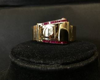 1950â€™s Gutenstein Brothers 14k Buckle Bangle With Over 3 Ctw Of Rubies 42.2g This 1950â€™s Designer Buckle Bangle Features 26, 12pt Princess Cut Rubies And 2, 15pt Cabochon Rubies, One On Each Side. This Bracelet Was Also Designed To Function As A Dress Clip. This Piece Is Guaranteed To Turn Heads At Every Occasion. Carat Weights Are Appropriate.
