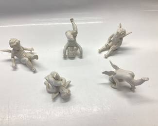 ANTIQUE PORCELAIN HALF DOLL MARIE ANTOINETTE AND A SET OF 5 PLAYFUL PORCELAIN CHERUB FIGURINES FROM THE EARLY 1900â€™s