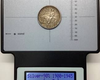 1925 STONE MOUNTAIN HALF DOLLAR DESIGNED BY GUTZON BORGLUM. THE 1925 STONE MT. HALF DOLLAR WAS STRUCK TO RAISE FUNDS FOR THE COMPLETION OF THE MONUMENT IN STONE MOUNTAIN, GEORGIA