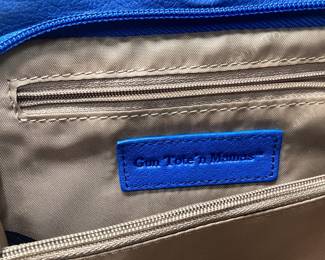 GUN TOTEâ€™N MAMA CONCEALED CARRY CROSSBODY BLUE LEATHER BAG