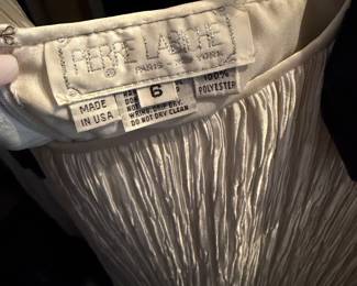 vintage Pierre Laroche "Paris – New York" white dress | Pierre Laroche was a prominent fashion designer known for his glamorous, sculptural designs, and this piece features his signature crinkled or "broomstick" pleated fabric | 34"–35" bust and a 25"–26" waist | $225 
