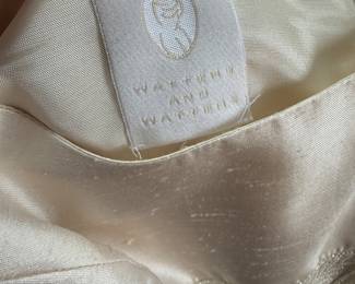 this Watters & Watters garment. Known for their refined bridal and special occasion designs, this piece is crafted from a lustrous, textured fabric | $100