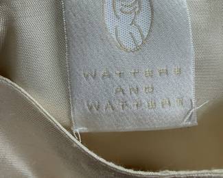 this Watters & Watters garment. Known for their refined bridal and special occasion designs, this piece is crafted from a lustrous, textured fabric | $100