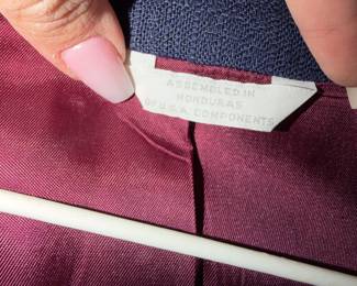 Navy quilted garment top and bottom manufactured using components from the U.S. and assembled in Honduras. $180