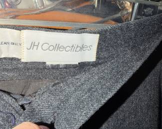  JH Collectibles Charcoal Wool Trousers | This timeless garment is crafted from a high-quality, heavy-weight wool blend in a versatile charcoal grey heather. The fabric features a fine, durable weave that provides both structure and warmth, making it an ideal staple for a professional or classic wardrobe.  $60