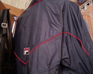  Fila Windbreaker pants | This lightweight windbreaker pant features a sleek black nylon shell accented with signature red contrast piping | $80