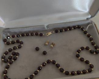 14 k gold necklace and earrings with natural gemstones