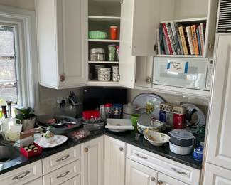 The kitchen is just packed great cookbooks wonderful cookware so you can come here and get something by yourself some cookware or some jewelry for your valentine