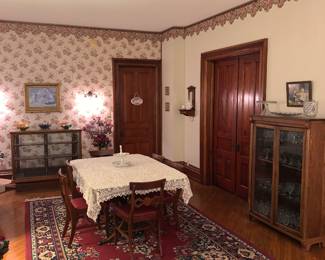 dining room of the Inn -table and 10 chairs for sale! Display cabinets; rug