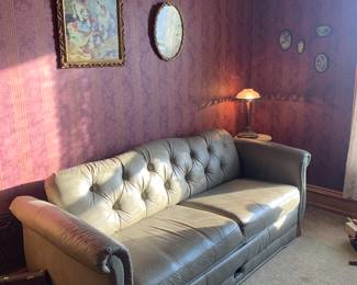 green hide-a-bed sofa