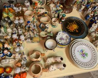 salt and pepper shakers; cream and sugars; plates