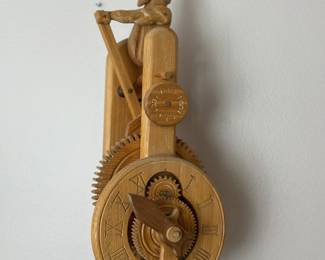Hand carved wooden mechanical clock 
