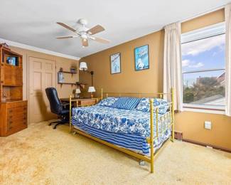 Brass trundle bed; bedroom/den/office furnishings by Ethan Allen