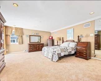 Master bedroom furnishings by Ethan Allen: queen bed