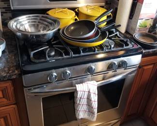 Frigidaire Gallery gas range; pots & pans