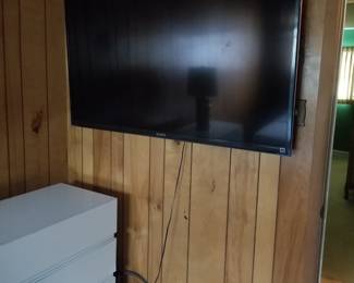Flat screen TV with bracket