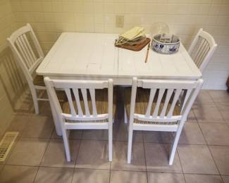 Tile top dining table seats 4