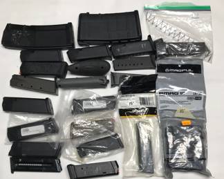 Sig Sauer P238 and various glock magazines