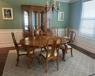 Bernhard dining table with two leaves. Six chairs-  hutch. Will sell separately.