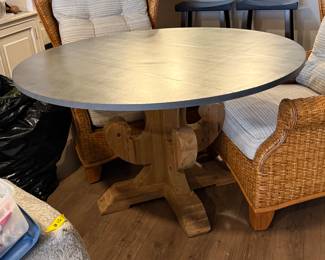 Zinc-top round dining table with wood base
