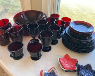 Ruby red plates, footed glasses, serving bowls