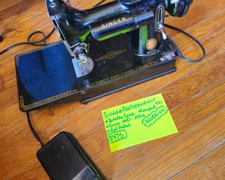 1951–52 Singer Featherweight 221 Sewing Machine – Working – With Case Description: Vintage Singer Featherweight 221 portable sewing machine, manufactured circa 1951–1952 in St. Johns, Quebec (ES serial prefix). This highly collectible model is in working condition and includes the original carrying case, foot pedal, motor, and cord. Black finish with gold decals in good vintage condition. Motor marked Singer Cat. GAJ6-8. Smooth handwheel rotation and running motor. Featherweights are known for their durability, precision stitching, and compact portability. Extremely popular with quilters and collectors. Estate sale find. Sold as-is due to age but currently operational. Serious buyers only.