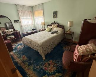 Antique Bedroom Set with Oriental Rug and Crocheted Bedspread