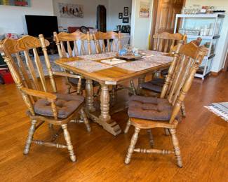 Amazing Dining Room table - 30.5” H x 50” L x 42” W - 2 captains chairs, 4 armless chairs, 2 leaves - 12” each
