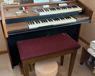 •	Baldwin organ with bench and music –                                                             32” H x 43” W x 24.5” D