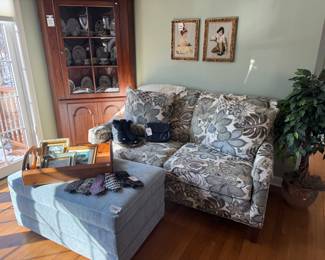 Smith Brothers Upholstered Ottoman, Ties, Wooden Handled Heart Tray, Frames, Faux Plants, Smith Brothers Botanical Loveseat, Coach Cafe Purse, Framed Needlepoint Portrait Pair, Pennsylvania House Corner Cabinet