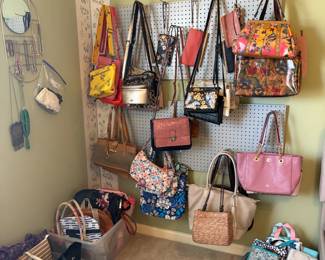 Purses including many high-end brands never used