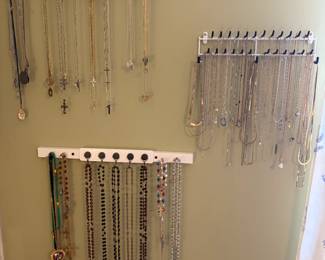 Jewelry crosses, hearts and rosarie beads