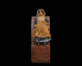 Carved Wooden Figurine of a Woman in Traditional Attire