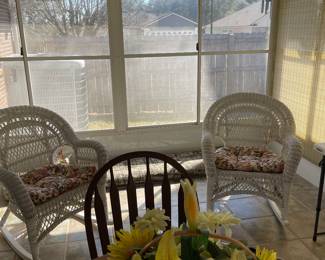 A pair of vintage wicker chairs