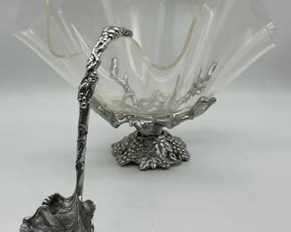 Arthur Court acrylic bowl with a handpolished cast aluminum stand and a matching ladle in the Grap