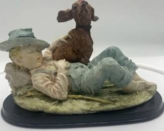 Giuseppe Armani figurine titled Boy Sleeping Dog Watching Over Him or Gullivers World