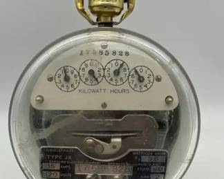 Lamp made from a vintage Sangamo Electric Company Type JA singlephase watthour meter. 
