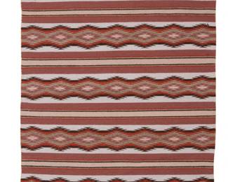 58
A Navajo Wide Ruins textile
Late 20th century, Diné, Mary McCray
Woven in burgundy, pale glue, mauve, brown, cranberry, and natural grey wool, with alternating bands of stacked serrated diamonds
42.5" H x 29.5" W
Estimate: $200 - $400