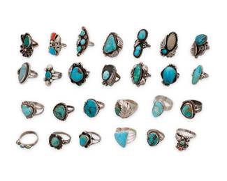 263
A group of Southwest style silver and turquoise rings
Mid/late 20th century
Eight variously marked for sterling and/or for maker: Max C. / Q.T. [Quoc Turquoise, Inc] / HY / Mexico
A large group comprising silver and set turquoise rings in various styles, many with silver feather overlay accents, in single stone and row-set designs, including one with set malachite, and one with turquoise and coral
26 pieces
Ring sizes: 10 to 5
164.6 grams gross
Estimate: $500 - $700