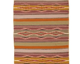 59
A Navajo Wide Ruins textile
Late 20th century, Diné, Marie Chester
Woven in multicolor wool, with alternating bands of stacked serrated diamonds
32" H x 20" W
Estimate: $200 - $300
