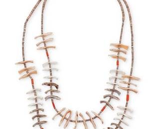 122
A Kewa/Santo Domingo Pueblo shell necklace
Late 20th century, New Mexico
Attributed to Mary C. Aguilar
Unmarked
A double strand heishi necklace with multiple carved shell birds and coral spacers
29" L
103.3 grams gross
Estimate: $400 - $600