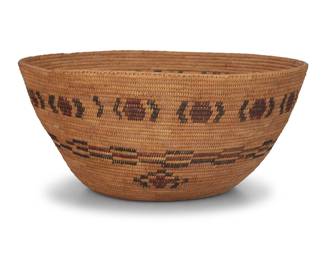 141
A large polychrome Yokuts basket
Early 20th century; Central California
A large coiled tapered basketry bowl with banded snake motifs and three floating elements near the base
7.25" H x 16" Dia.
Estimate: $500 - $700