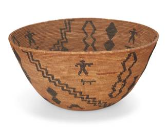138
A large polychrome pictorial Yokuts basket
Early 20th century; Central California
A large coiled tapered bowl with various floating elements including standing male figures and animals, as well as stepped diagonal columns and stacked diamond motifs
7" H x 14.75" Dia.
Estimate: $700 - $900