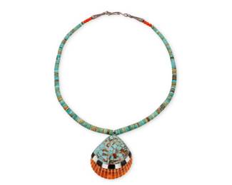 121
A Kewa/Santo Domingo Pueblo inlay shell pendant necklace
Mid/late 20th century, New Mexico
With a single strand of graduated turquoise disc beads suspending a shell pendant with turquoise and mother-of-pearl mosaic inlay
19.25" L x 2.25" H
42.4 grams gross
Estimate: $100 - $200