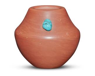 105
Dora Tse-Pé (1939-2022, Zia/San Ildefonso Pueblo)
A diminutive redware pottery turquoise inset jarlet, 1985
Incised signature and date to underside: Dora / Tse Pé / 85
2" H x 2" Dia.
Estimate: $400 - $600