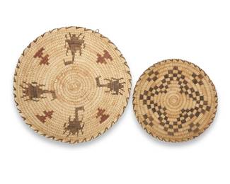 234
Two Papago baskets
Early/mid-20th century, Tohono O'odham; Arizona, Southwest United States
Comprising a polychrome Papago polychrome pictorial coiled basketry tray, with four scorpion motifs by Rosario Ventura (3" H x 11" Dia.), as well as a smaller Papago basketry tray with checkerboard star motif by Stella Mendez (1" H x 8" Dia.)
2 pieces
Estimate: $100 - $200