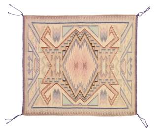 49
A Navajo Burntwater raised outline textile
Late 20th century, Diné, Orlinda Nez
Woven in multicolor wool, with central double diamond and various hooked, stepped, and serrated motifs
24.5" H x 28" W
Estimate: $300 - $500